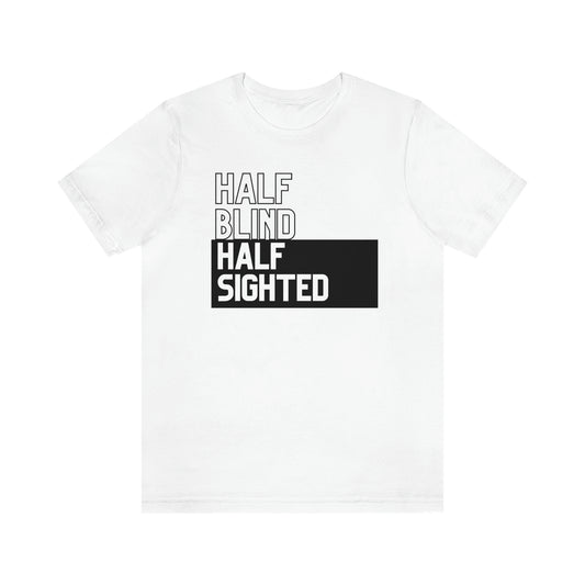 White t shirt half blind black letters half sighted white letters in black box